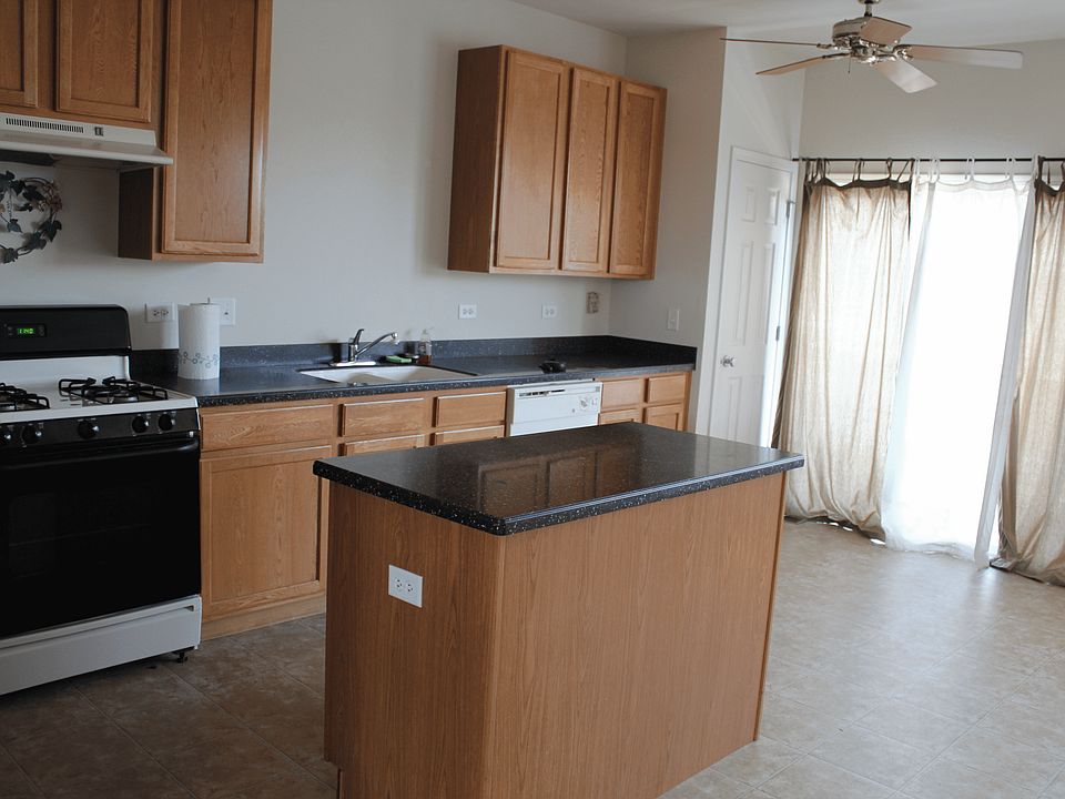 Kitchen leading to large deck