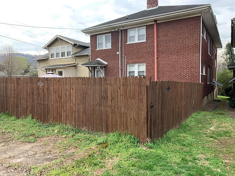 Shared Fenced In Backyard!