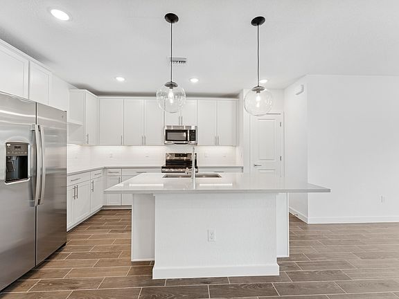 Kitchen with pendant lights