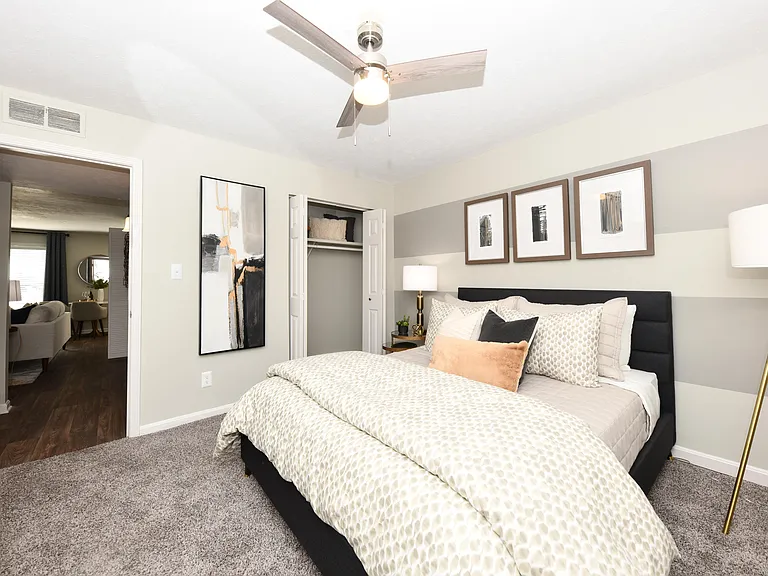 Bedroom with carpet & ceiling fan