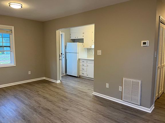 living room opens into kitchen