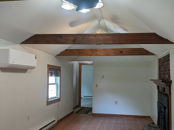 Living room with cathedral ceiling.