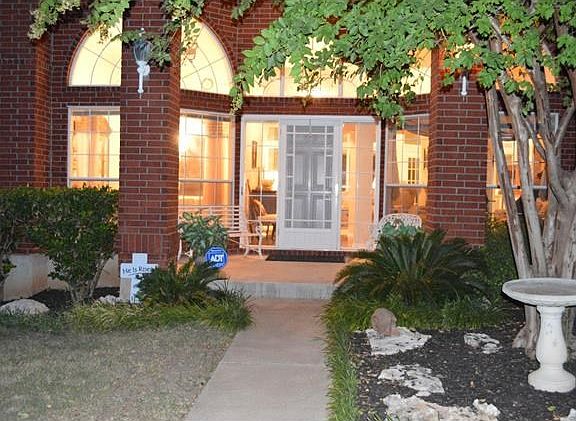 Front porch/patio and entry.