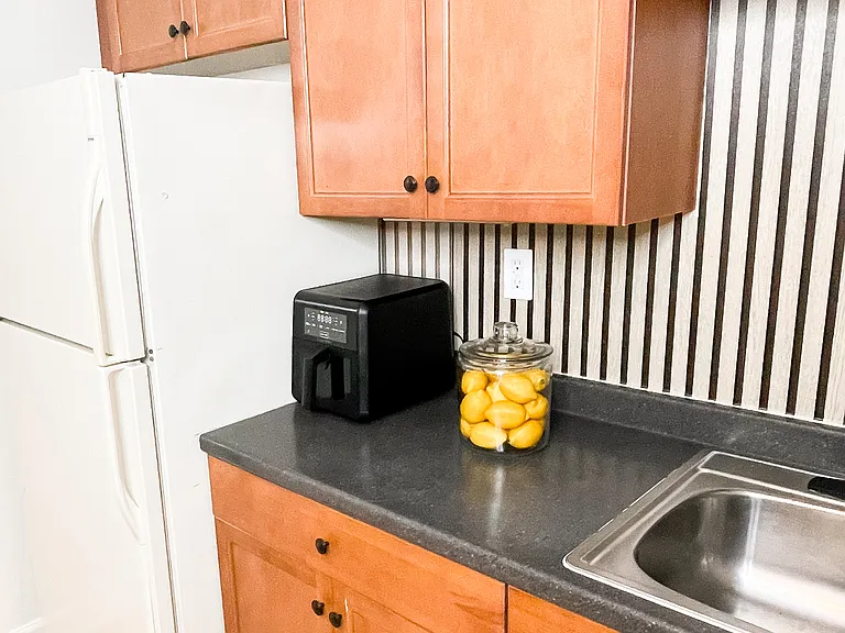 Well-equipped kitchen with ample counter space and appliances
