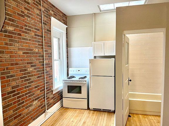 Brick exposed walls and newer appliances