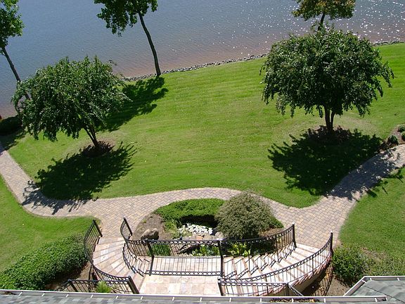 Concrete Deck/Dual Staircase and Paverstone Walkway to lake