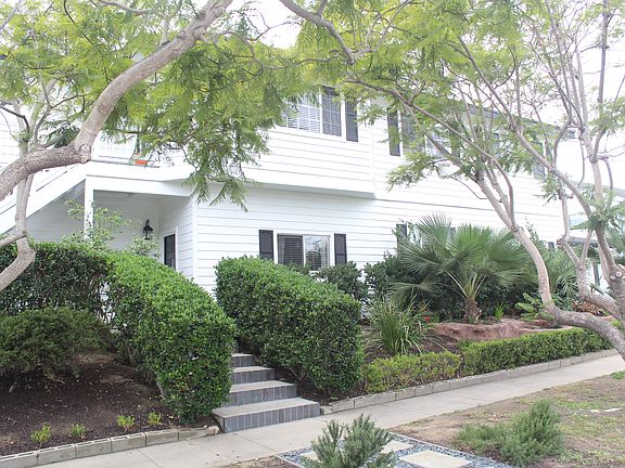 Entrance to unit, ground level with steps.