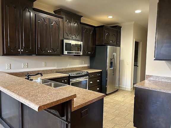 4th image of 11417 Magnolia Wood Ave