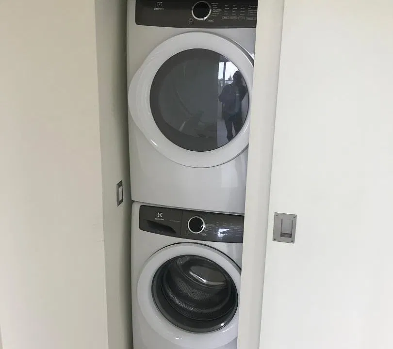 Front loading washer and dryer in unit