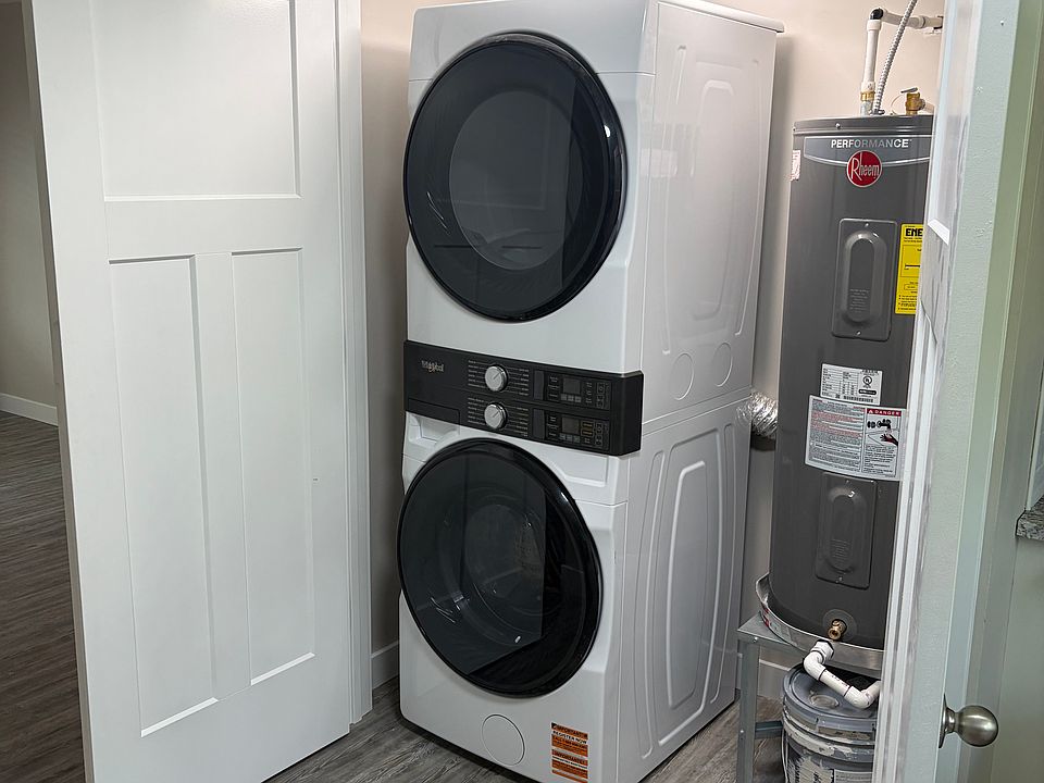 WASHER, DRYER, & HOT WATER HEATER CLOSET. LEFT OF THE STOVE AND ACCESSED FROM KITCHEN.