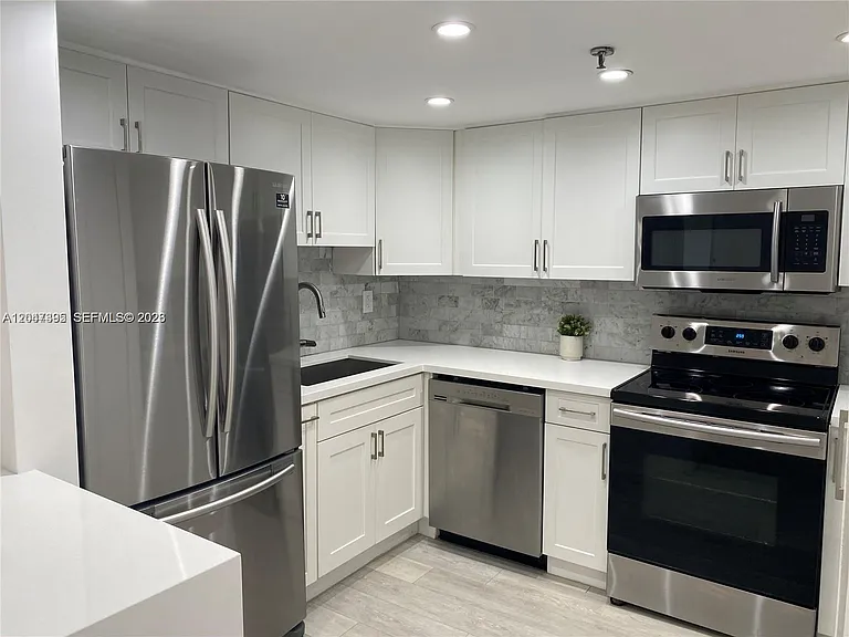 911 E Ponce De Leon Blvd #301 — Photo 16