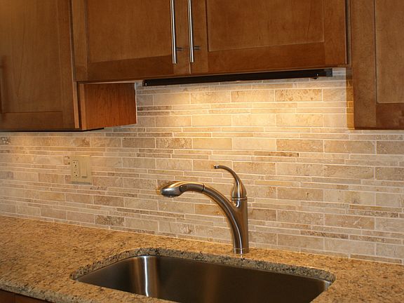 Granite countertops with stone backsplash