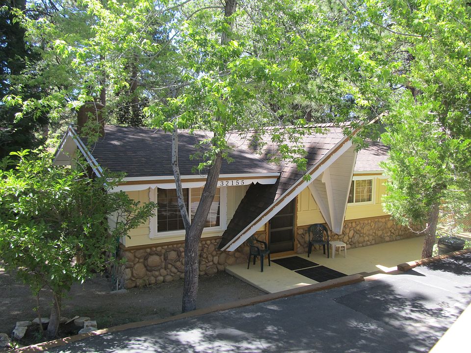 Nestled on a near leve lot