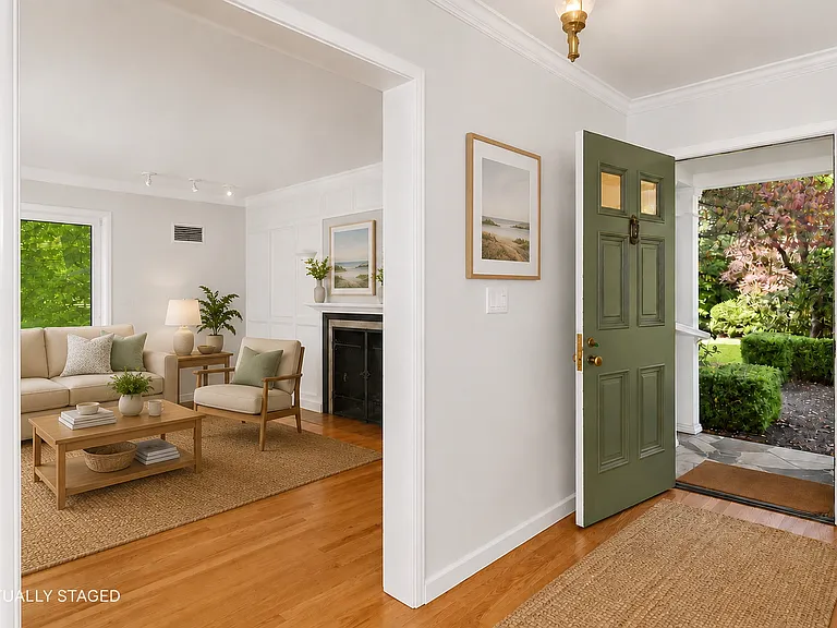 Front entrance with garden opens to living room
