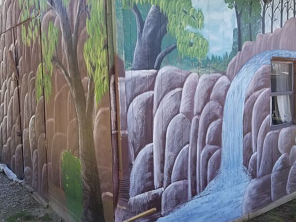 Corner of barn on property. 