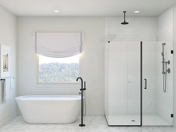 Primary bath with freestanding tub glass shower enclosure