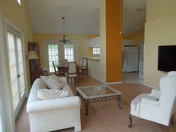 Living Room Dining Room with Cathedral Ceilings