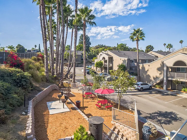 An aerial view of a BBQ & Picnic Area and property at Meadow Creek Apartments in San Marcos, CA