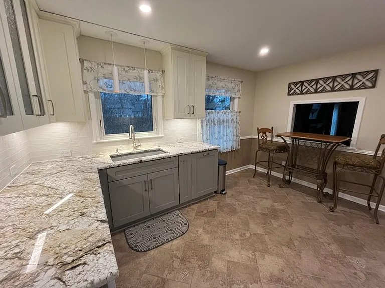 NEW Kitchen - cabinets, lighting sink, faucet, very quiet disposal, in kitchen breakfast nook.