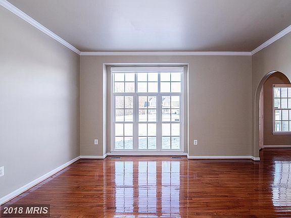 STUDY/LIBRARY WITH FLOOR TO CEILING WINDOW
