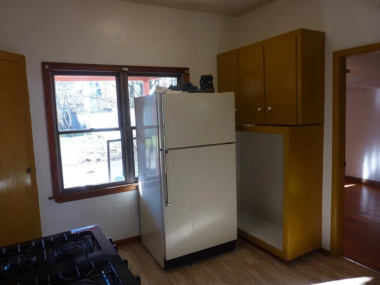 Kitchen. Alternate locations for refrigerator are possible.