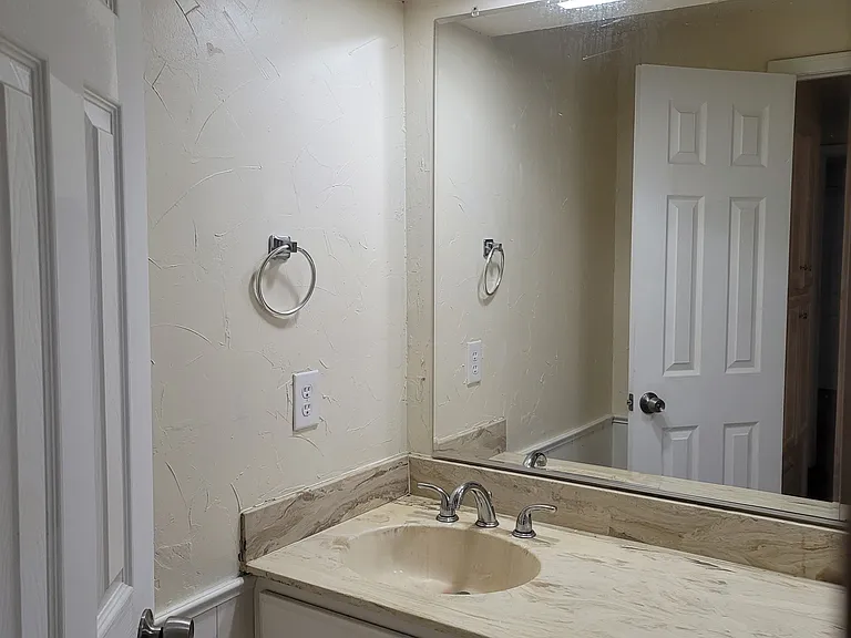 Upstairs guest bathroom second sink in double vanity.