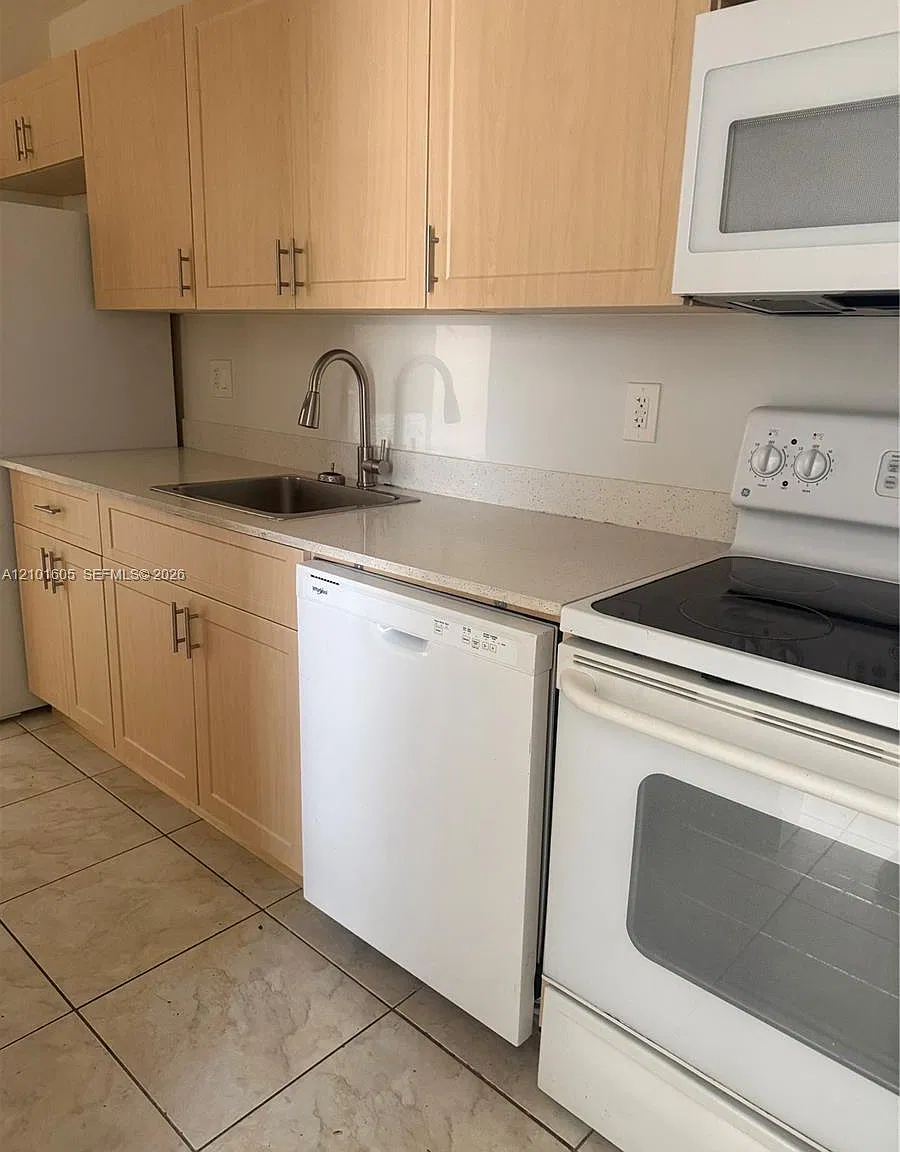 Century Garden Condo — Photo 1