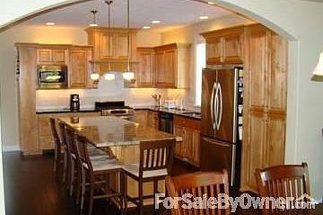 Great Room
						:
						Great Room with Heat N Glow gas see through fireplace. Beautiful french doors.