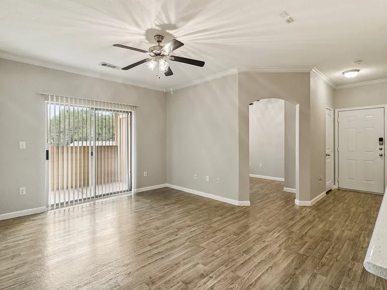 Open Living Room and Sectioned Dining Area at Mission Hills Apartments, Texas, 78258