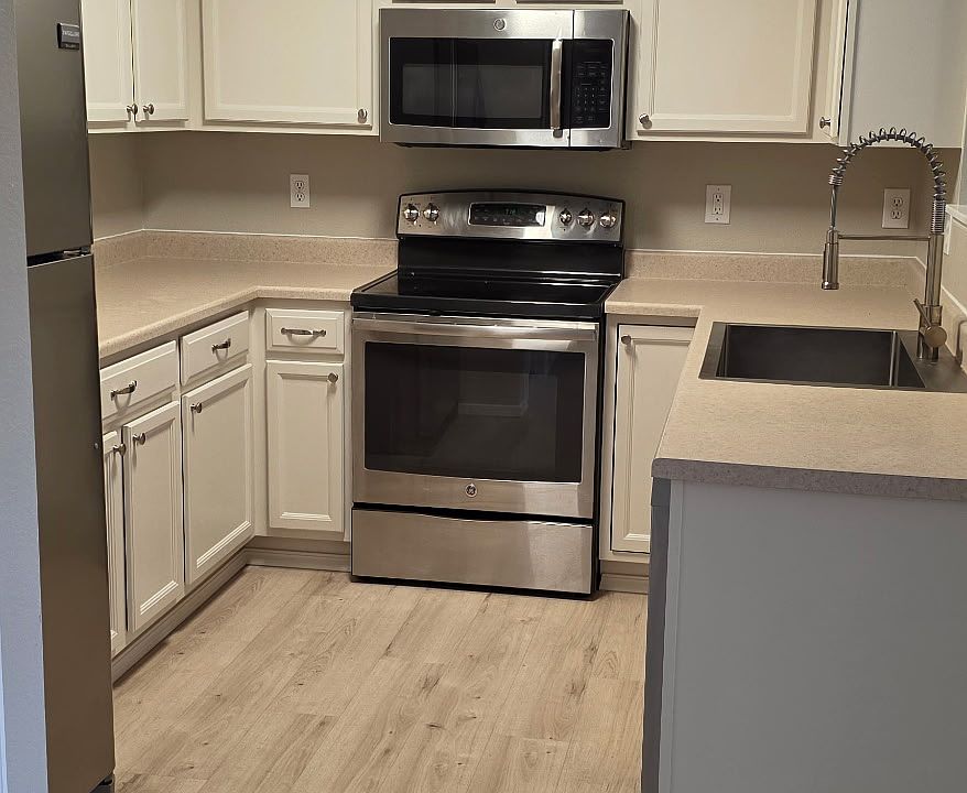 Refreshed cabinets! View from dining area