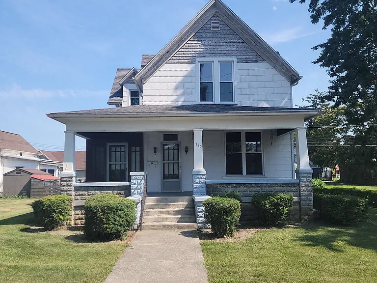 210 E 3rd St — Photo 1