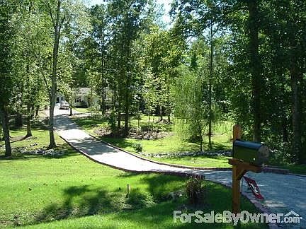 Prettiest Lot On The Street!
						:
						You'll have compliments from your neighbors about what a pretty yard this is!