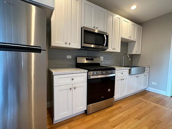 2nd image of 6556 S Mozart St #1
