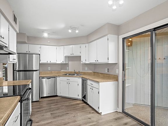 Eat in kitchen with enclosed porch