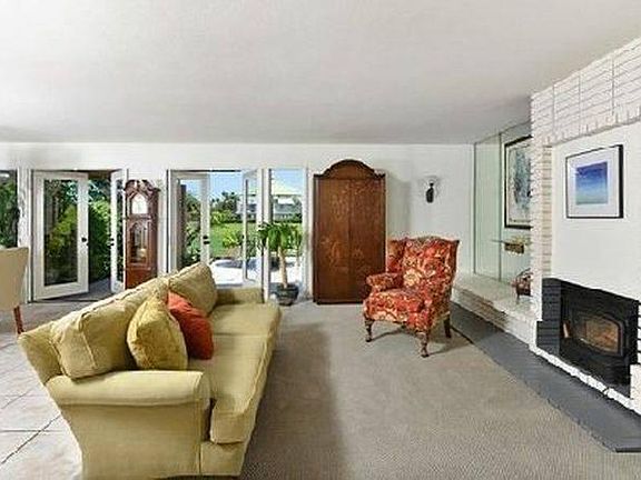 Spacious living room with view golf course view