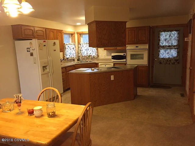 Dining Area to and Kitchen
