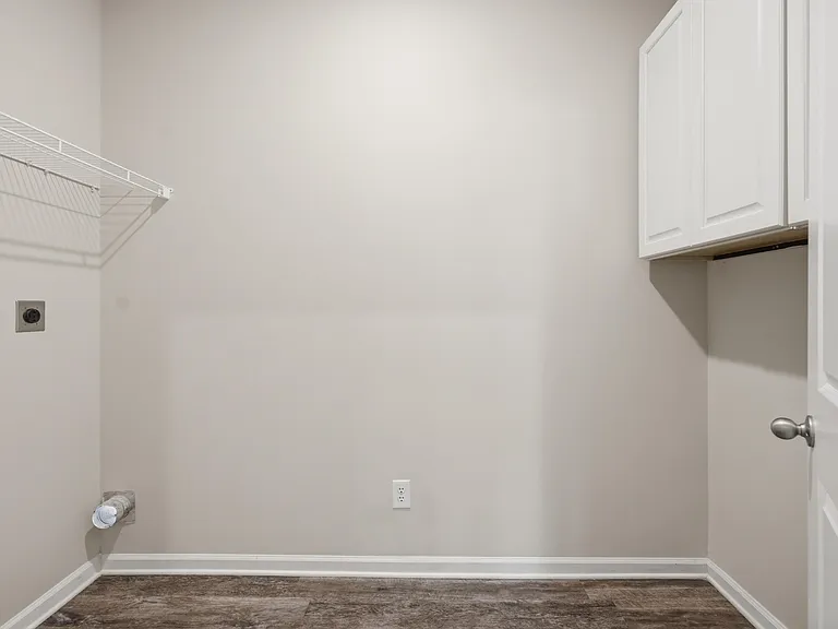 Spacious laundry room with storage