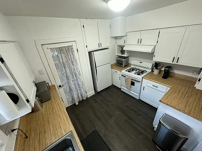 Kitchen with microwave, Toaster oven, coffee maker, dishwasher, etc.