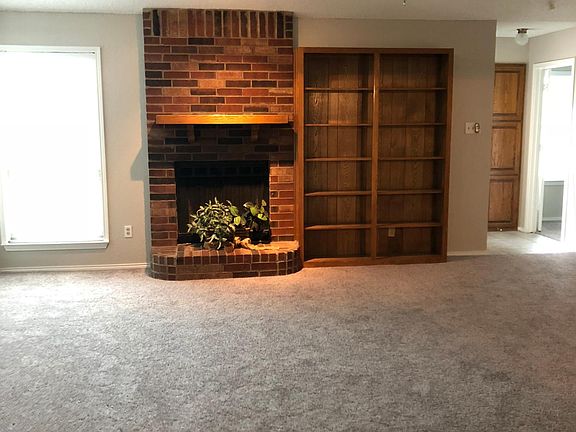 WBFP and display area in spacious Living Room