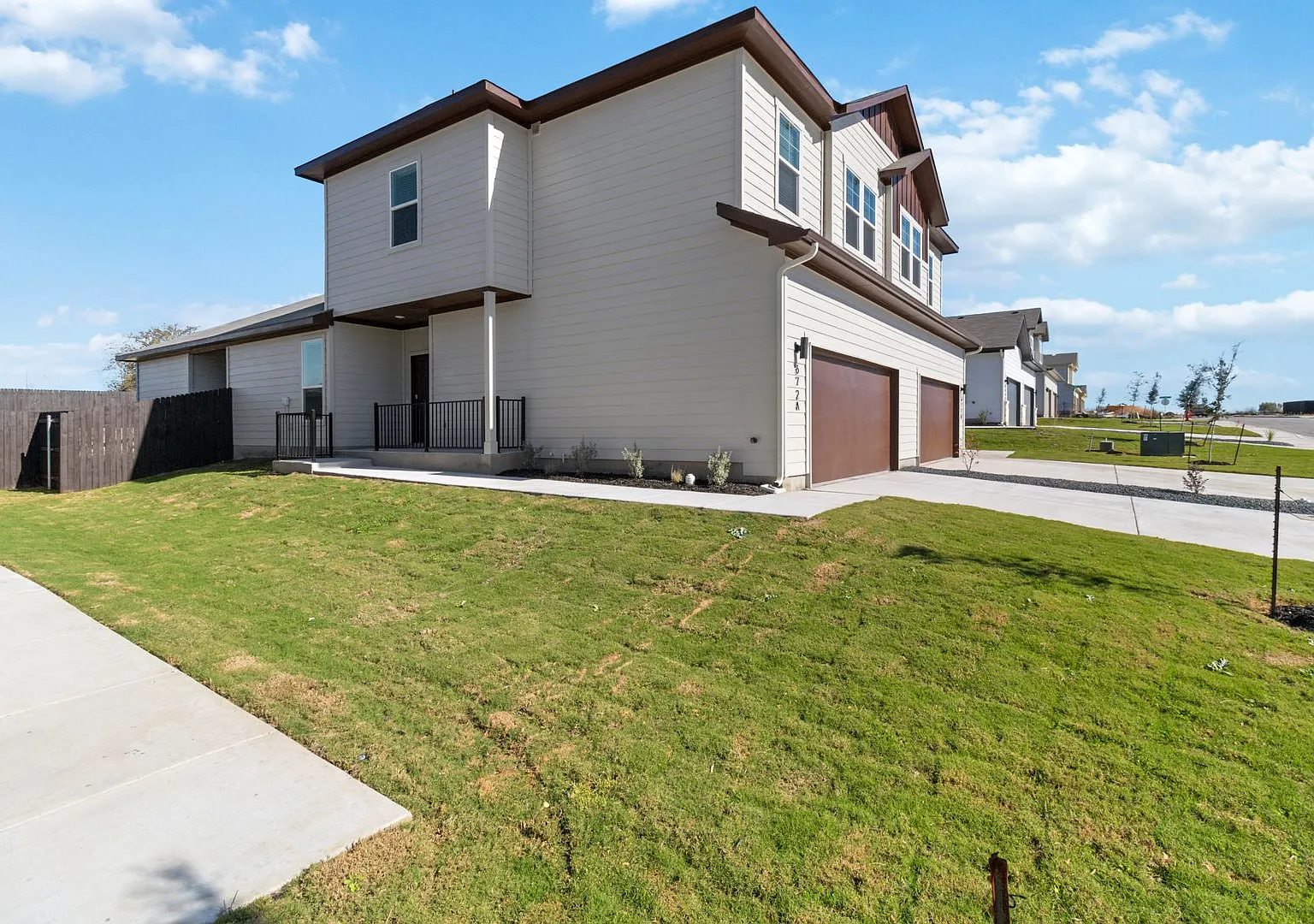 Brand-New 4-Bedroom Emma Park Home with Private Yard & 2-Car Garage — Photo 2