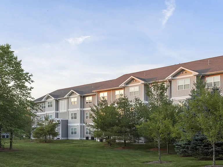 Garden-style buildings in park-like setting