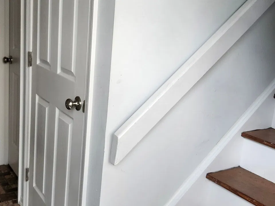 Basement Stairs Shoe Closet Bath door