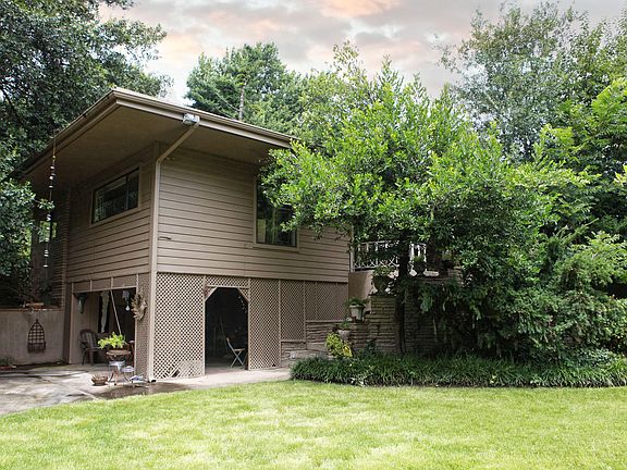 An artist's studio is tucked under the main level of the home