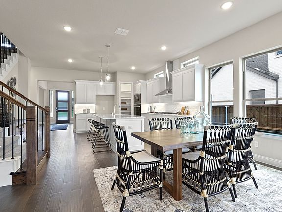 REPRESENTATIVE PHOTO - Open first floor in the Plaza home plan by Trophy Signature Homes