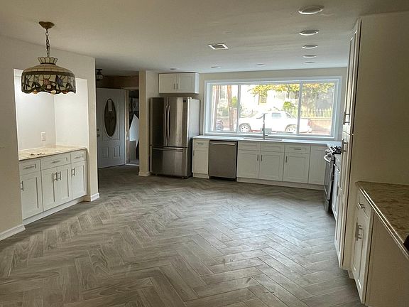 Kitchen with new stainless steel appliances