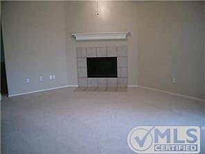 Woodburning fireplace in living room