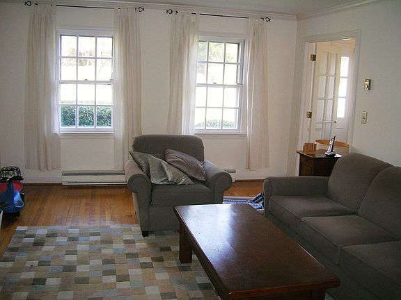 Living room furnished here, unfurnished in next photo