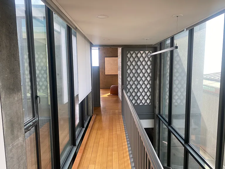 Hallway to primary bedroom
