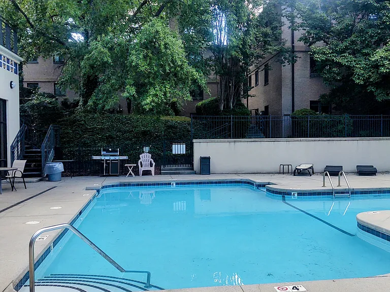 Pool area with small workout room to the left.