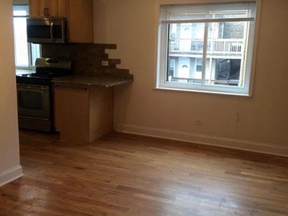 Dining area. You could put a few barstools at counter top. I had a 6 chair dining room table here.